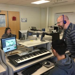 High School students creating music content in the Music Lab.