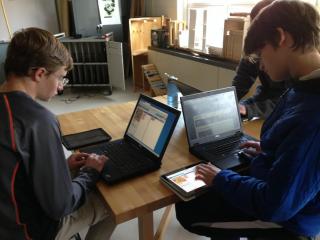 High School students coding during an Hour of Code activity.