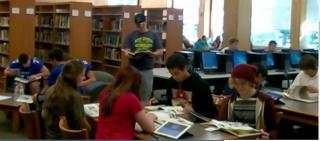 High School students working in the library.