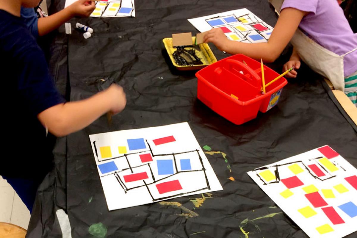 Students at work on their Mondrian paintings